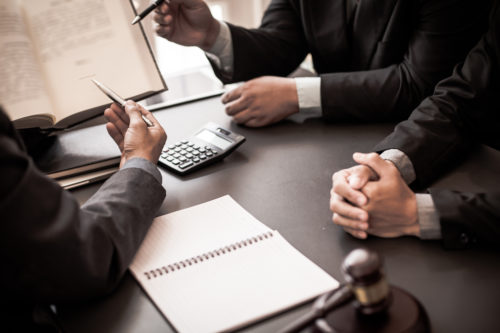 lawyers reviewing documents