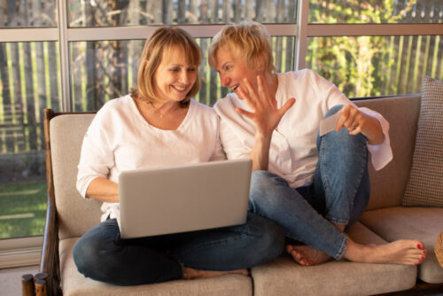 couple using laptop