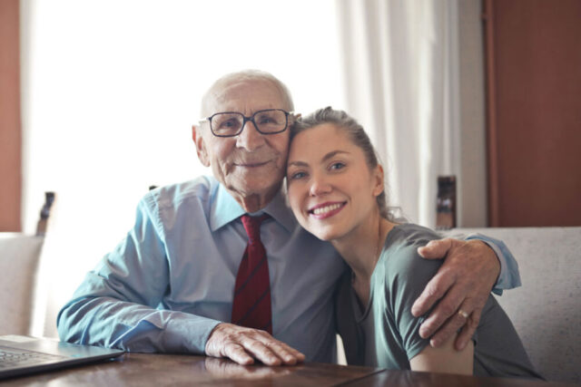 grandfather granddaughter posing