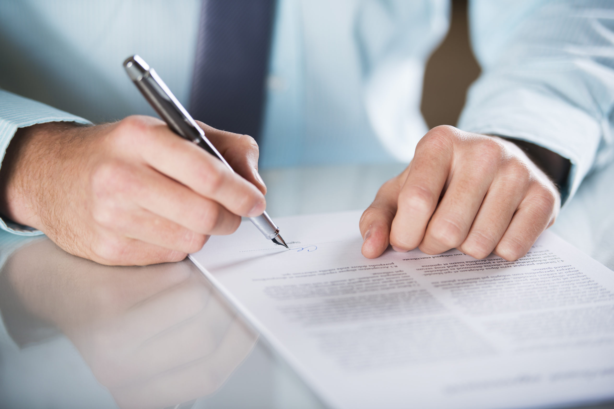 graphicstock businessman is signing a contract business contract details_H0ERuOAcWZ scaled 1