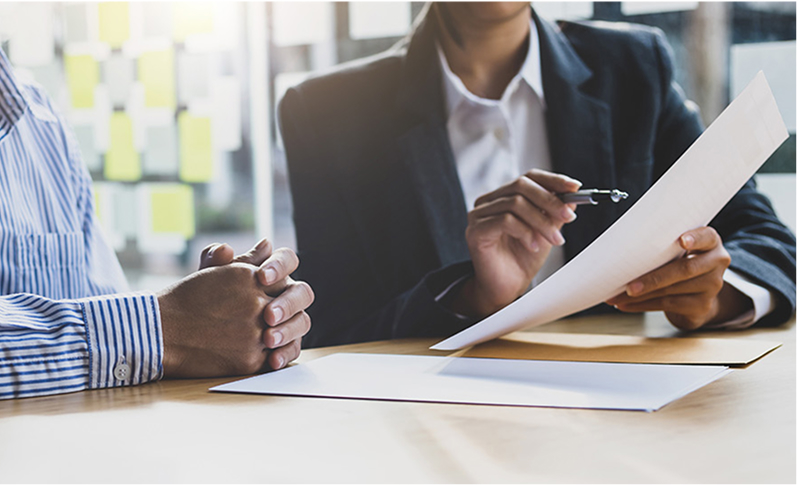 lawyer explaining the terms of a legal document
